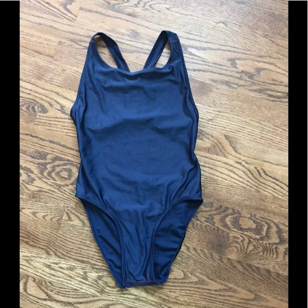 Speedo like racing one piece swimsuit. Solid Blue normal cut.
